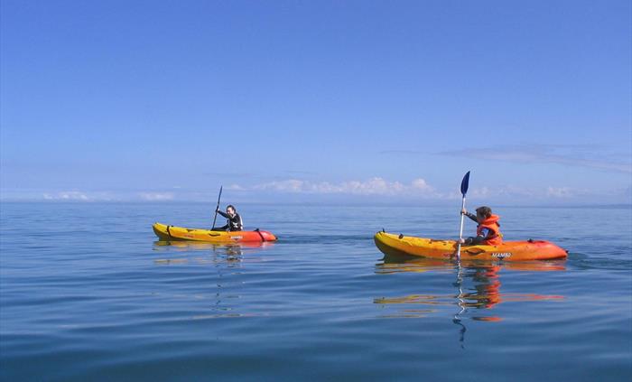 two kayakers off New Quay